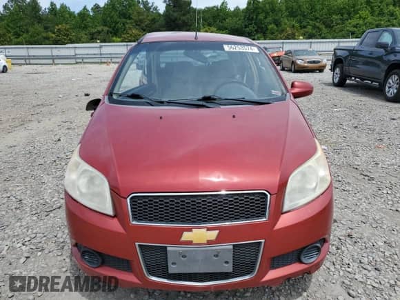 2011 Chevrolet Aveo LS z VIN KL1TD6DEXBB133793, wystawiony jako Copart lot #65723304 z przebiegiem Nie podano mil oraz Szkoda całkowita • Salvage title. Historia ofert i sprzedaży dostępna na DreamBid. Obrazek 5.