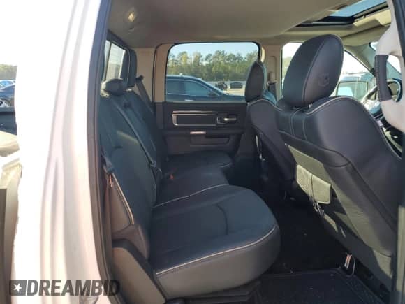 2015 Ram 1500 Laramie Limited z VIN 1C6RR7WM3FS728609, wystawiony jako Copart lot #80263024 z przebiegiem 57 297 mil mil oraz Szkoda całkowita • Salvage title. Historia ofert i sprzedaży dostępna na DreamBid. Obrazek 10.