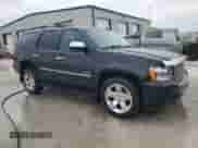 2011 Chevrolet Tahoe LTZ with VIN 1GNSKCE03BR298773, listed as a Copart auction lot 52601865 with 143,729 mi miles and Salvage title. Bid and sale history available at DreamBid. Image 4.