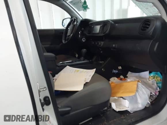 2018 Toyota Tacoma SR with VIN 5TFRX5GN9JX122396, listed as a IAAI auction lot 42933585 with 107,492 mi miles and . Bid and sale history available at DreamBid. Image 5.