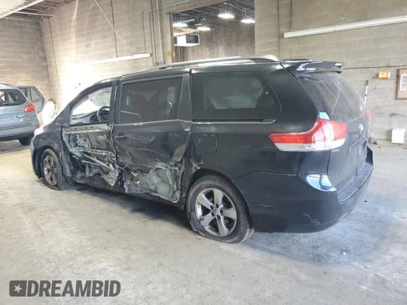2011 Toyota Sienna LE с VIN 5TDKK3DC7BS010324, выставлен на аукционе Copart как лот 80947105 с пробегом 190 567 миль миль и Списание • Salvage title. История ставок и продаж доступна на DreamBid. Изображение 2.