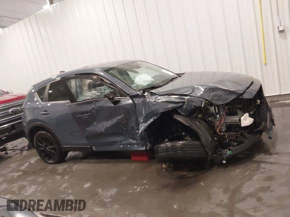 2022 Mazda CX-5 S Preferred z VIN JM3KFBCM0N0644033, wystawiony jako IAAI lot #41620156 z przebiegiem 23 280 mil mil oraz . Historia ofert i sprzedaży dostępna na DreamBid. Obrazek 14.