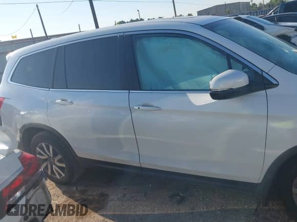 2022 Honda Pilot EX-L with VIN 5FNYF5H55NB017674, listed as a IAAI auction lot 43138855 with 54,954 mi miles and . Bid and sale history available at DreamBid. Image 12.