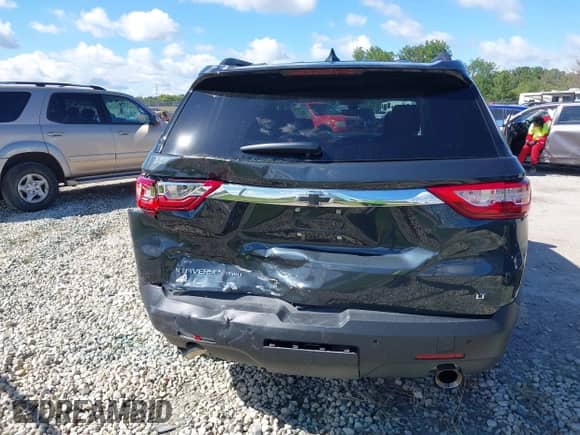 2019 Chevrolet Traverse LT with VIN 1GNEVHKW5KJ247901, listed as a IAAI auction lot 43071080 with 77,109 mi miles and . Bid and sale history available at DreamBid. Image 16.