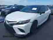 2023 Toyota Camry TRD with VIN 4T1KZ1AKXPU082659, listed as a IAAI auction lot 42901043 with 65,567 mi miles and . Bid and sale history available at DreamBid. Image 2.