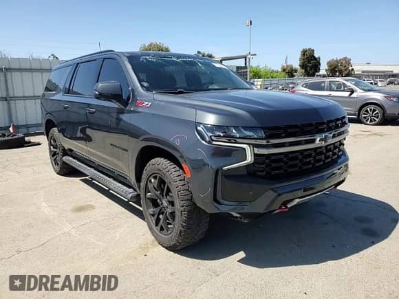 2022 Chevrolet Suburban Z71 с VIN 1GNSKDKD4NR320510, выставлен на аукционе Copart как лот 57088855 с пробегом 68 558 миль миль и Списание • Salvage title. История ставок и продаж доступна на DreamBid. Изображение 15.