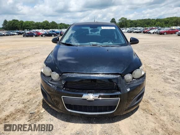 2012 Chevrolet Sonic LT z VIN 1G1JD5SB6C4109315, wystawiony jako Copart lot #61291025 z przebiegiem 143 603 mil mil oraz Czysty tytuł • Clean title. Historia ofert i sprzedaży dostępna na DreamBid. Obrazek 5.