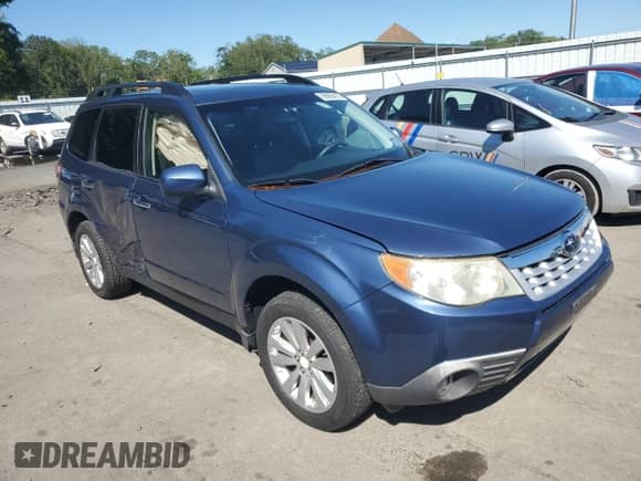 2011 Subaru Forester X Limited z VIN JF2SHAFC3BH773091, wystawiony jako Copart lot #69989415 z przebiegiem 148 987 mil mil oraz Szkoda całkowita • Salvage title. Historia ofert i sprzedaży dostępna na DreamBid. Obrazek 4.