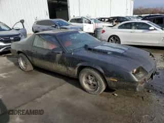 1987 Chevrolet Camaro с VIN 1G1FP21S3HN163444, выставлен на аукционе Copart как лот 81341854 с пробегом 663 270 миль миль и Чистый • Clean title. История ставок и продаж доступна на DreamBid. Изображение 4.