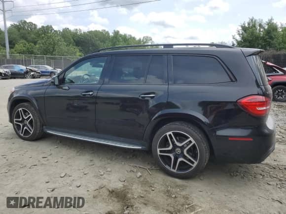 2019 Mercedes-Benz GLS 550 with VIN 4JGDF7DE2KB223383, listed as a Copart auction lot 59771305 with 66,193 mi miles and Salvage title. Bid and sale history available at DreamBid. Image 2.