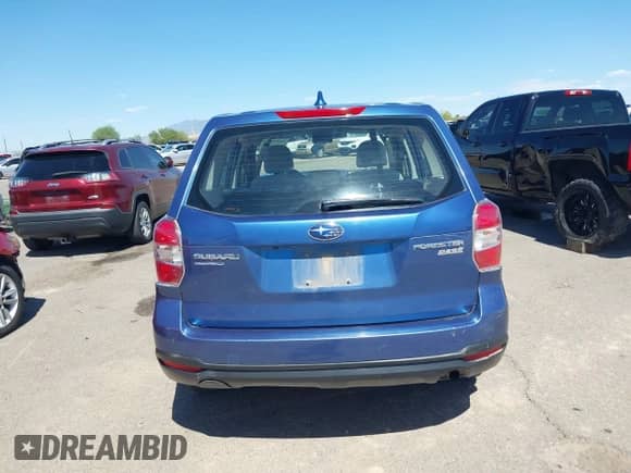 2016 Subaru Forester 2.5i with VIN JF2SJAAC9GG490784, listed as a IAAI auction lot 42845580 with 96,166 mi miles and . Bid and sale history available at DreamBid. Image 17.