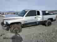 1998 Dodge 2500 with VIN 1B7KF23D1WJ131443, listed as a Copart auction lot 86404184 with 303,655 mi miles and Salvage title. Bid and sale history available at DreamBid. Image 1.