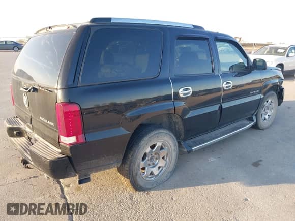 2004 Cadillac Escalade z VIN 1GYEK63N74R304237, wystawiony jako IAAI lot #43427246 z przebiegiem 183 166 mil mil oraz . Historia ofert i sprzedaży dostępna na DreamBid. Obrazek 4.