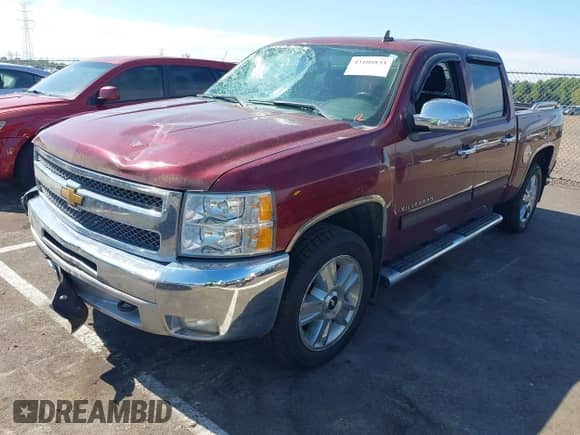 2013 Chevrolet Silverado 1500 LT with VIN 3GCPKSE77DG344677, listed as a IAAI auction lot 43108833 with 166,074 mi miles and . Bid and sale history available at DreamBid. Image 2.
