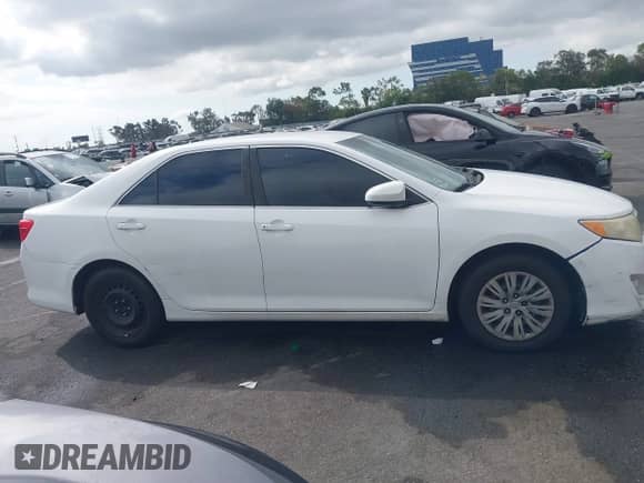 2012 Toyota Camry L z VIN 4T4BF1FK6CR226130, wystawiony jako IAAI lot #43221512 z przebiegiem 158 050 mil mil oraz . Historia ofert i sprzedaży dostępna na DreamBid. Obrazek 13.