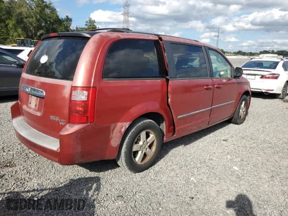 2009 Dodge Grand Caravan SXT z VIN 2D8HN54179R584664, wystawiony jako Copart lot #82564285 z przebiegiem Nie podano mil oraz Szkoda całkowita • Salvage title. Historia ofert i sprzedaży dostępna na DreamBid. Obrazek 3.