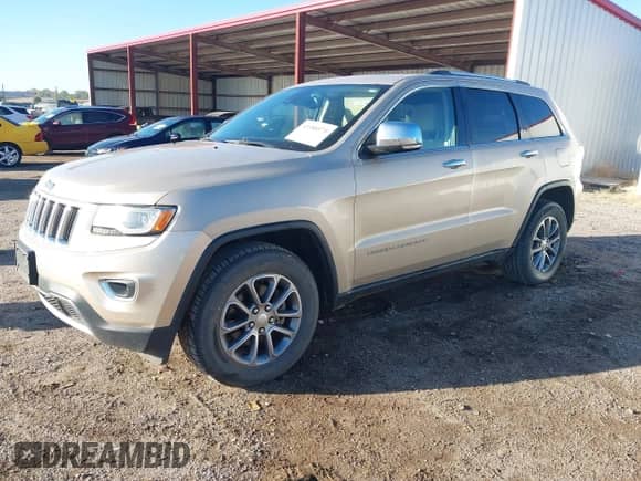 2014 Jeep Grand Cherokee Limited with VIN 1C4RJFBG0EC379735, listed as a IAAI auction lot 43388970 with 211,184 mi miles and . Bid and sale history available at DreamBid. Image 2.