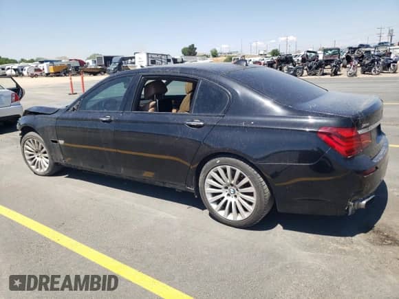 2013 BMW 7 Series 740Li xDrive with VIN WBAYF4C52DD127862, listed as a Copart auction lot 61093035 with 161,403 mi miles and Salvage title. Bid and sale history available at DreamBid. Image 2.