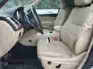 2012 Jeep Grand Cherokee Limited z VIN 1C4RJFBG8CC300891, wystawiony jako Copart lot #84041155 z przebiegiem 141 239 mil mil oraz Czysty tytuł • Clean title. Historia ofert i sprzedaży dostępna na DreamBid. Obrazek 7.