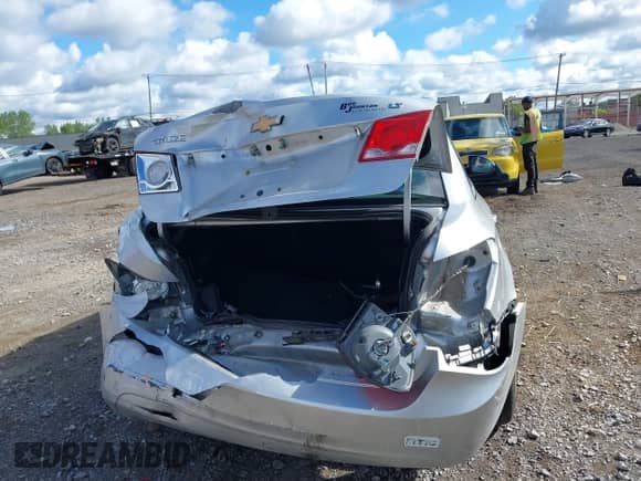 2014 Chevrolet Cruze 1LT with VIN 1G1PC5SB3E7321779, listed as a IAAI auction lot 43059154 with 163,469 mi miles and . Bid and sale history available at DreamBid. Image 16.