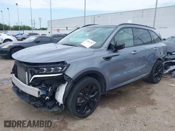 2023 Kia Sorento SX with VIN 5XYRK4LF1PG178030, listed as a IAAI auction lot 42894787 with 26,008 mi miles and . Bid and sale history available at DreamBid. Image 2.