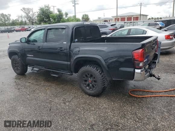 2022 Toyota Tacoma SR with VIN 3TMCZ5AN5NM511508, listed as a Copart auction lot 80245915 with 58,279 mi miles and Salvage title. Bid and sale history available at DreamBid. Image 2.