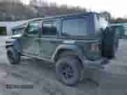 2021 Jeep Wrangler Unlimited Willys Sport with VIN 1C4HJXDG1MW737422, listed as a Copart auction lot 42213845 with 77,363 mi miles and Salvage title. Bid and sale history available at DreamBid. Image 2.