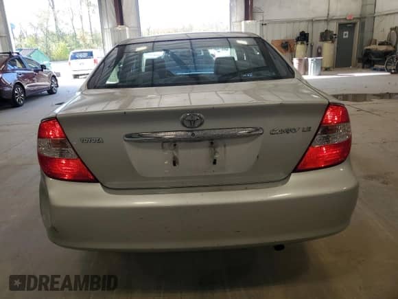 2003 Toyota Camry LE с VIN 4T1BE32K83U138775, выставлен на аукционе Copart как лот 86869435 с пробегом 181 650 миль миль и На запчасти • Non repairable. История ставок и продаж доступна на DreamBid. Изображение 6.