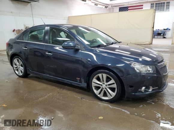 2014 Chevrolet Cruze LTZ with VIN 1G1PG5SB4E7411611, listed as a Copart auction lot 71350025 with 120,634 mi miles and Clean title. Bid and sale history available at DreamBid. Image 4.