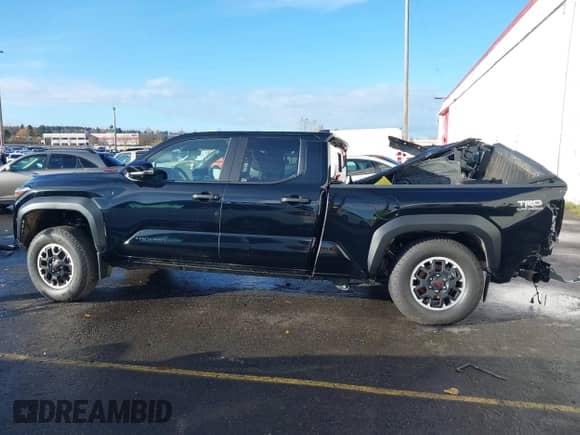 2024 Toyota Tacoma SR5 with VIN 3TMLB5JNXRM049327, listed as a IAAI auction lot 40906568 with 691 mi miles and . Bid and sale history available at DreamBid. Image 14.