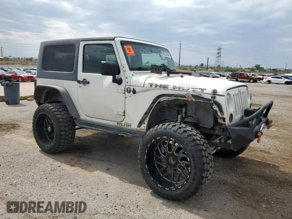 2008 Jeep Wrangler X с VIN 1J4FA24118L627350, выставлен на аукционе Copart как лот 82374345 с пробегом 217 748 миль миль и Списание • Salvage title. История ставок и продаж доступна на DreamBid. Изображение 4.