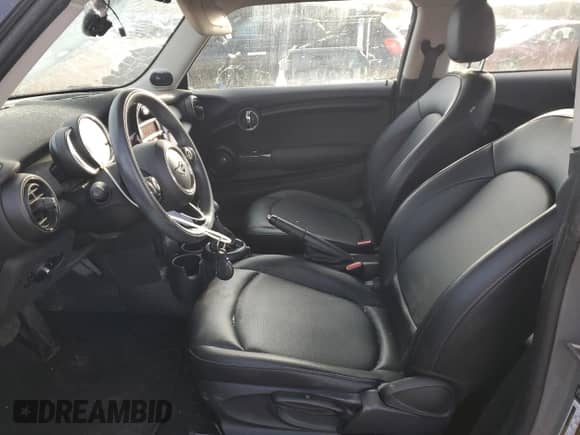 2015 MINI Hardtop with VIN WMWXM5C50FT937233, listed as a Copart auction lot 50077295 with 87,785 mi miles and Salvage title. Bid and sale history available at DreamBid. Image 7.