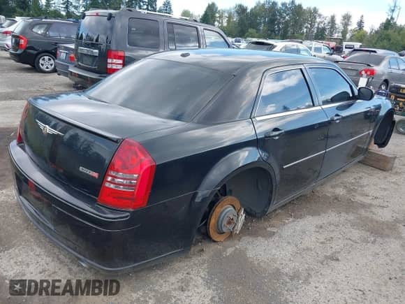 2006 Chrysler 300 C SRT-8 with VIN 2C3LA73W36H450317, listed as a IAAI auction lot 43148082 with 110,634 mi miles and . Bid and sale history available at DreamBid. Image 4.