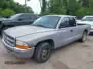 2000 Dodge Dakota z VIN 1B7GL22X7YS781191, wystawiony jako IAAI lot #42498147 z przebiegiem 283 341 mil mil oraz . Historia ofert i sprzedaży dostępna na DreamBid. Obrazek 2.