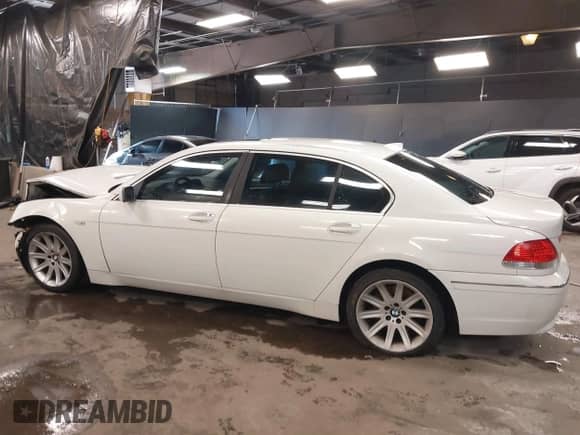 2003 BMW 7 Series 745Li z VIN WBAGN63463DR08268, wystawiony jako IAAI lot #41355287 z przebiegiem 210 333 mil mil oraz . Historia ofert i sprzedaży dostępna na DreamBid. Obrazek 14.