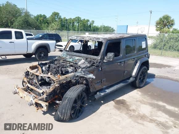 2021 Jeep Wrangler Unlimited Sahara z VIN 1C4JJXP60MW643293, wystawiony jako IAAI lot #42276393 z przebiegiem Nie podano mil oraz . Historia ofert i sprzedaży dostępna na DreamBid. Obrazek 2.