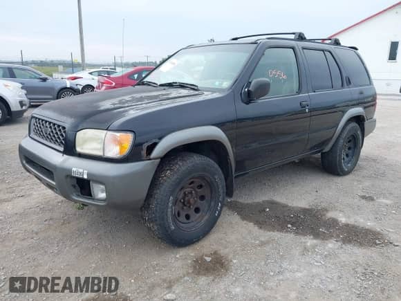 2001 Nissan Pathfinder SE z VIN JN8DR07Y01W502836, wystawiony jako IAAI lot #43290556 z przebiegiem 175 075 mil mil oraz . Historia ofert i sprzedaży dostępna na DreamBid. Obrazek 2.