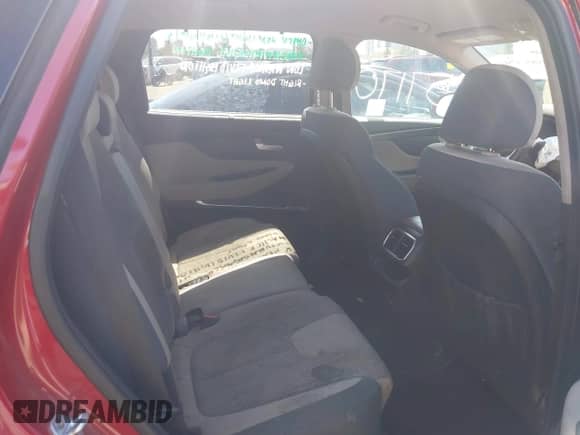 2019 Hyundai Santa Fe SEL with VIN 5NMS33AD7KH113627, listed as a IAAI auction lot 41857170 with 75,813 mi miles and . Bid and sale history available at DreamBid. Image 8.