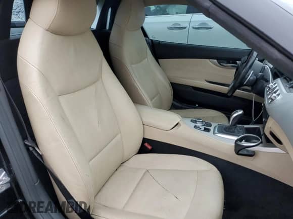 2012 BMW Z4 sDrive28i с VIN WBALL5C56CE716558, выставлен на аукционе Copart как лот 62003125 с пробегом 93 438 миль миль и Списание • Salvage title. История ставок и продаж доступна на DreamBid. Изображение 10.