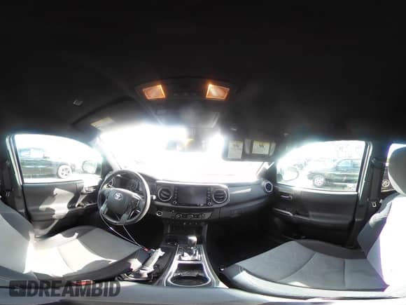 2020 Toyota Tacoma SR5 z VIN 3TMBZ5DN7LM026596, wystawiony jako IAAI lot #40705410 z przebiegiem 123 489 mil mil oraz . Historia ofert i sprzedaży dostępna na DreamBid. Obrazek 19.