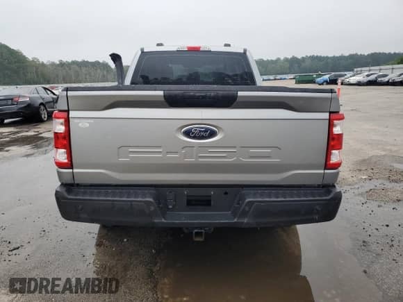 2021 Ford F-150 XLT with VIN 1FTEX1C59MKD30325, listed as a Copart auction lot 67388015 with 198,783 mi miles and Salvage title. Bid and sale history available at DreamBid. Image 6.