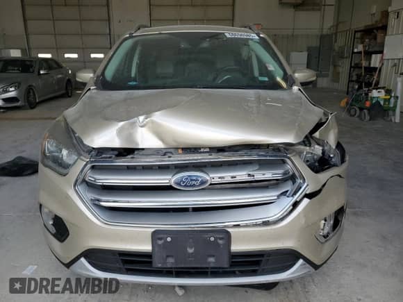 2017 Ford Escape Titanium с VIN 1FMCU0JD8HUE35755, выставлен на аукционе Copart как лот 68698985 с пробегом 111 087 миль миль и Списание • Salvage title. История ставок и продаж доступна на DreamBid. Изображение 5.