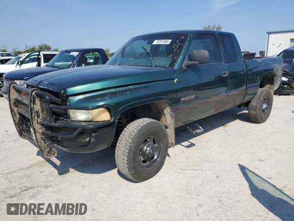 2002 Dodge 2500 with VIN 3B7KF23622M281527, listed as a Copart auction lot 70297065 with 317,620 mi miles and Salvage title. Bid and sale history available at DreamBid. Image 1.