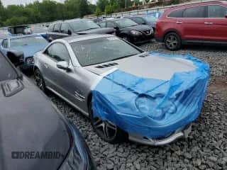 2003 Mercedes-Benz SL 55/63 AMG with VIN WDBSK74F83F053491, listed as a Copart auction lot 60541025 with 82,030 mi miles and Salvage title. Bid and sale history available at DreamBid. Image 1.