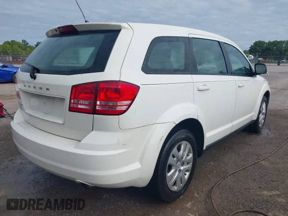2014 Dodge Journey American Value with VIN 3C4PDCAB2ET247194, listed as a IAAI auction lot 42968008 with 142,469 mi miles and . Bid and sale history available at DreamBid. Image 4.