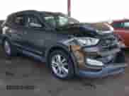 2014 Hyundai Santa Fe with VIN 5XYZW3LAXEG140814, listed as a IAAI auction lot 43296039 with 115,419 mi miles and . Bid and sale history available at DreamBid. Image 1.