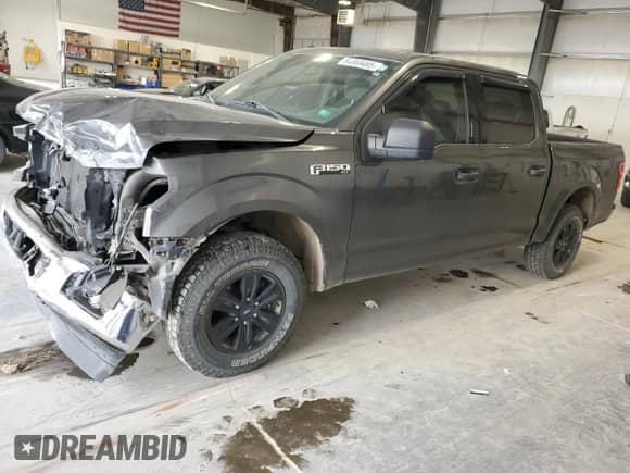 2018 Ford F-150 XLT z VIN 1FTEW1EPXJFD61668, wystawiony jako Copart lot #84369465 z przebiegiem 121 612 mil mil oraz Szkoda całkowita • Salvage title. Historia ofert i sprzedaży dostępna na DreamBid. Obrazek 1.