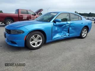 2019 Dodge Charger SXT with VIN 2C3CDXBG9KH670394, listed as a Copart auction lot 68632245 with 124,663 mi miles and Salvage title. Bid and sale history available at DreamBid. Image 1.