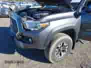 2018 Toyota Tacoma SR5 with VIN 5TFSZ5AN8JX150047, listed as a IAAI auction lot 43474593 with 38,427 mi miles and . Bid and sale history available at DreamBid. Image 6.
