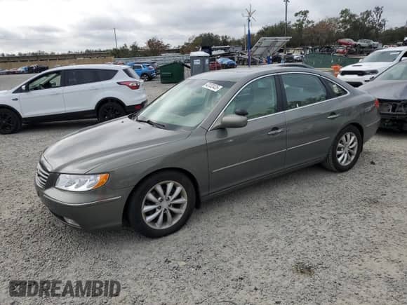 2007 Hyundai Azera SE с VIN KMHFC46F47A188414, выставлен на аукционе Copart как лот 43132425 с пробегом 74 289 миль миль и Списание • Salvage title. История ставок и продаж доступна на DreamBid. Изображение 1.